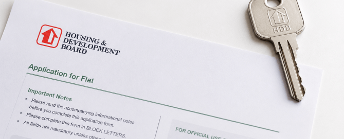 HDB key and document representing transfer of ownership after divorce in Singapore